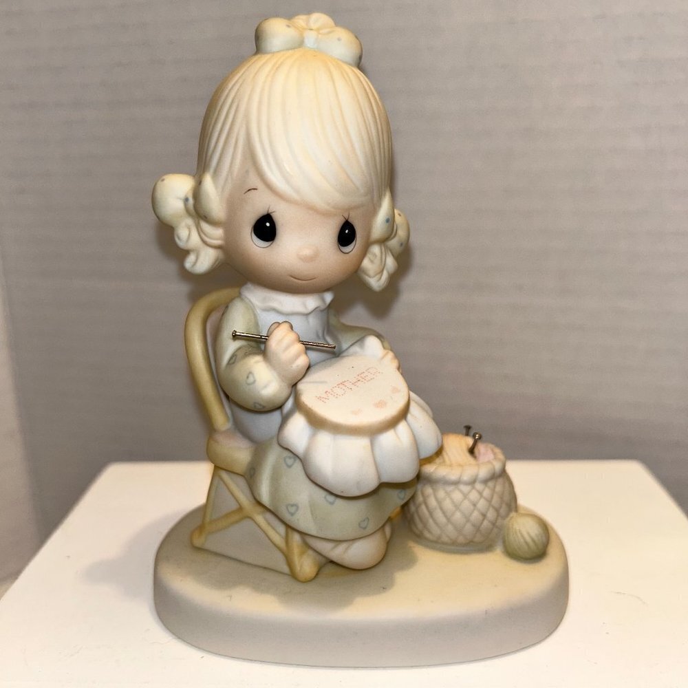 Precious Moments "Mother Sew dear” figurine
